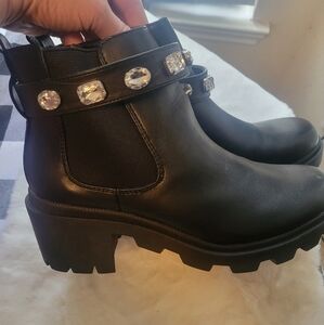 Women's Black boots from a New day. Never worn. Size 10